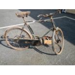 A good old Sunbeam bicycle together with spares.