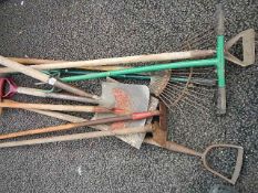 A quantity of assorted garden tools.