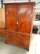 A Victorian mahogany linen press in need of restoration (missing shelves and other work needed.