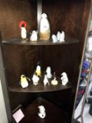 A good lot of penguins, by Coalport, Beswick, Wade, Aynsley,