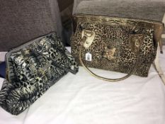 A fabulous Butler and Wilson leopard handbag and a Butler and Wilson black and white animal print