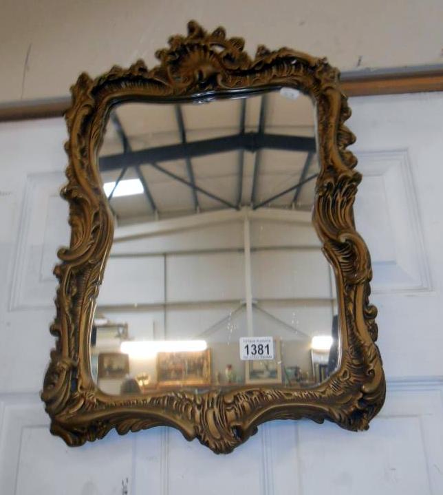 A vintage reproduction ornate decorative Chippendale style mirror 55cm x 37cm