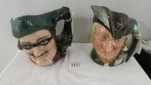 Two Royal Doulton character jugs - Robin Hood and Dick Turpin.