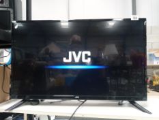 A working JVC 32" HD LCD TV with remote