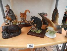 A shelf of assorted animals etc.