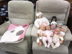 A good lot of dolls including new borns and a child's bedroom rug