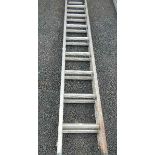 An aluminium double ladder.