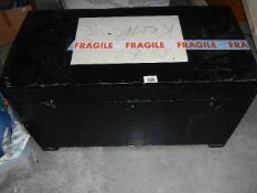 A large painted pine box.