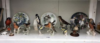 A collection of Goebel bird figurines & other bird related items ( some with slight chipping)