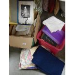 Two boxes of doll patterns, fabric, sheet music etc.