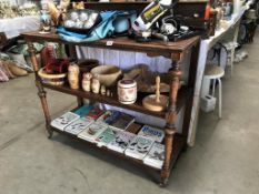 A Victorian oak dumb waiter shelf set.