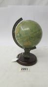 A 1930's Crawfords tin plate 'Globe' by Chad Valley biscuit tin.