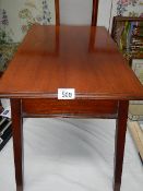 An early 20th century mahogany side table.