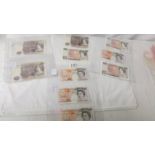 Ten UK ten pound notes of various ages.