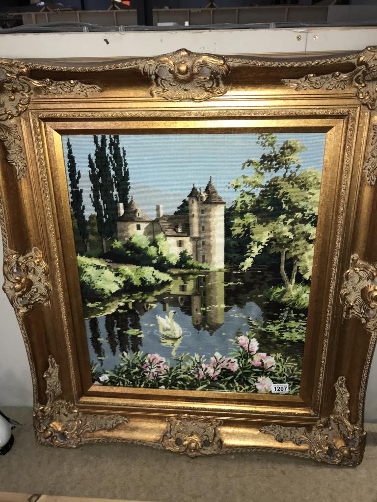 A fabulous gilt framed wool work tapestry of a French castle reflected in a lake by Philippa