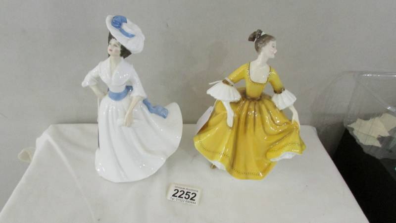Two Royal Doulton figurines - Stephanie HN2807 and Margaret HN2397.