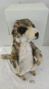 A boxed Steiff meercat. in very good condition.