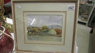 A framed and glazed watercolour farmhouse scene signed B Nock '90.