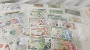 A collection of Jersey, Guernsey and Isle of Man bank notes (approximate face value (£160).