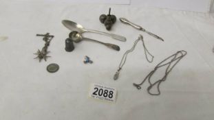 A mixed lot including 2 silver spoons, a silver thimble and other items.