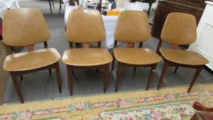 A set of 4 Elliot's of Newbury (EON) teak dining chairs in very good condition.