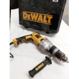 A Dewalt D21570 hammer drill with case.