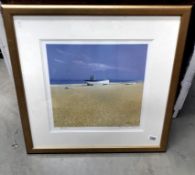 A limited edition print of a fishing boat on beach 284/500 signed Spence 66cm x 66cm