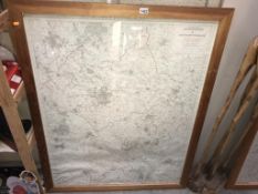 A large pine framed ordnance survey map of Leicester and Northamptonshire 106cm x 132cm