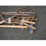 A quantity of assorted garden tools.