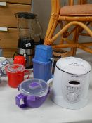 A blender, ice crusher, deep fat fryer and 3 other items.