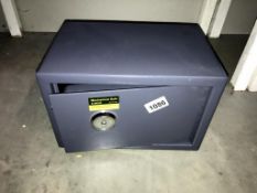 A mechanical safe with key 31cm x 20cm x 20cm