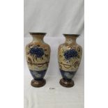 A pair of Doulton Slater vases, 32 cm, (one has repair to base).
