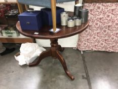 A dark pine round kitchen table Diameter 90cm,