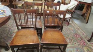 A set o 4 period oak chairs.