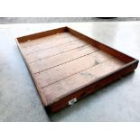 A large wooden tray