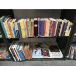 A selection of books on yoga (2 shelves)