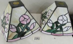 Two Tiffany style lamp shades.