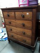 A Victorian mahogany veneered chest of drawers height 127cm, width 105cm,