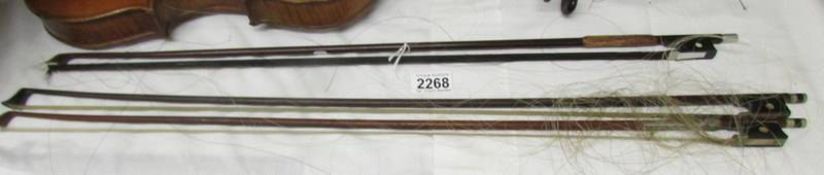 Three violin bows, a/f.