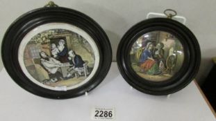 Two 19th century framed Pratt ware pot lids.