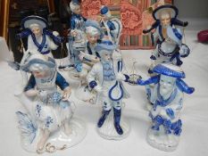 A quantity of blue and white figures.