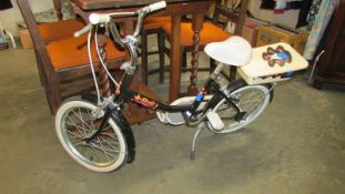 A vintage child's Raleigh Magic bicycle in very good condition.