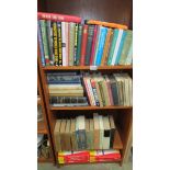 4 shelves of books relating to mathematics, calculus etc.