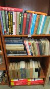 4 shelves of books relating to mathematics, calculus etc.