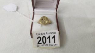 A 375/9ct gold signet ring, size R, 7.9 grams.