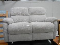 A good 2 seater ivory coloured sofa.