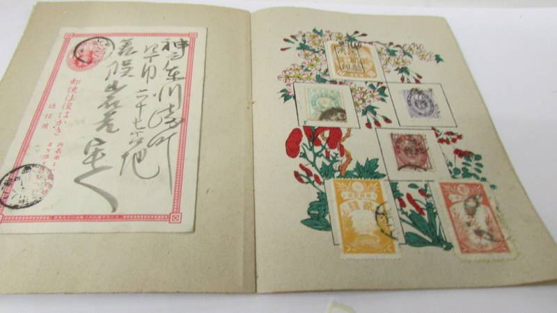 A Japanese album of Japanese stamps and postcards. - Image 5 of 7