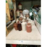 A collection of glazed/named jugs & pots