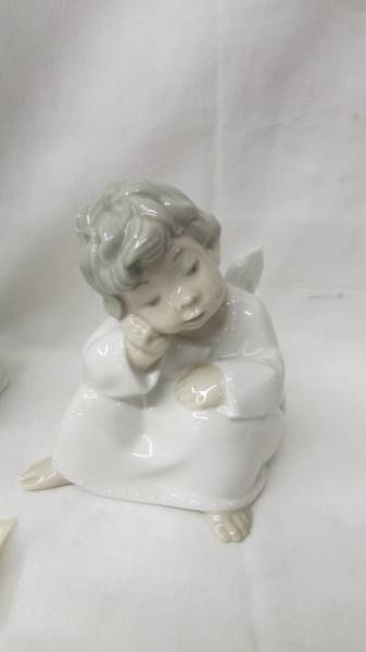 Two Lladro figurines - boy and girl praying and and angel. - Image 2 of 3