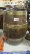 An old brass bound oak barrel.